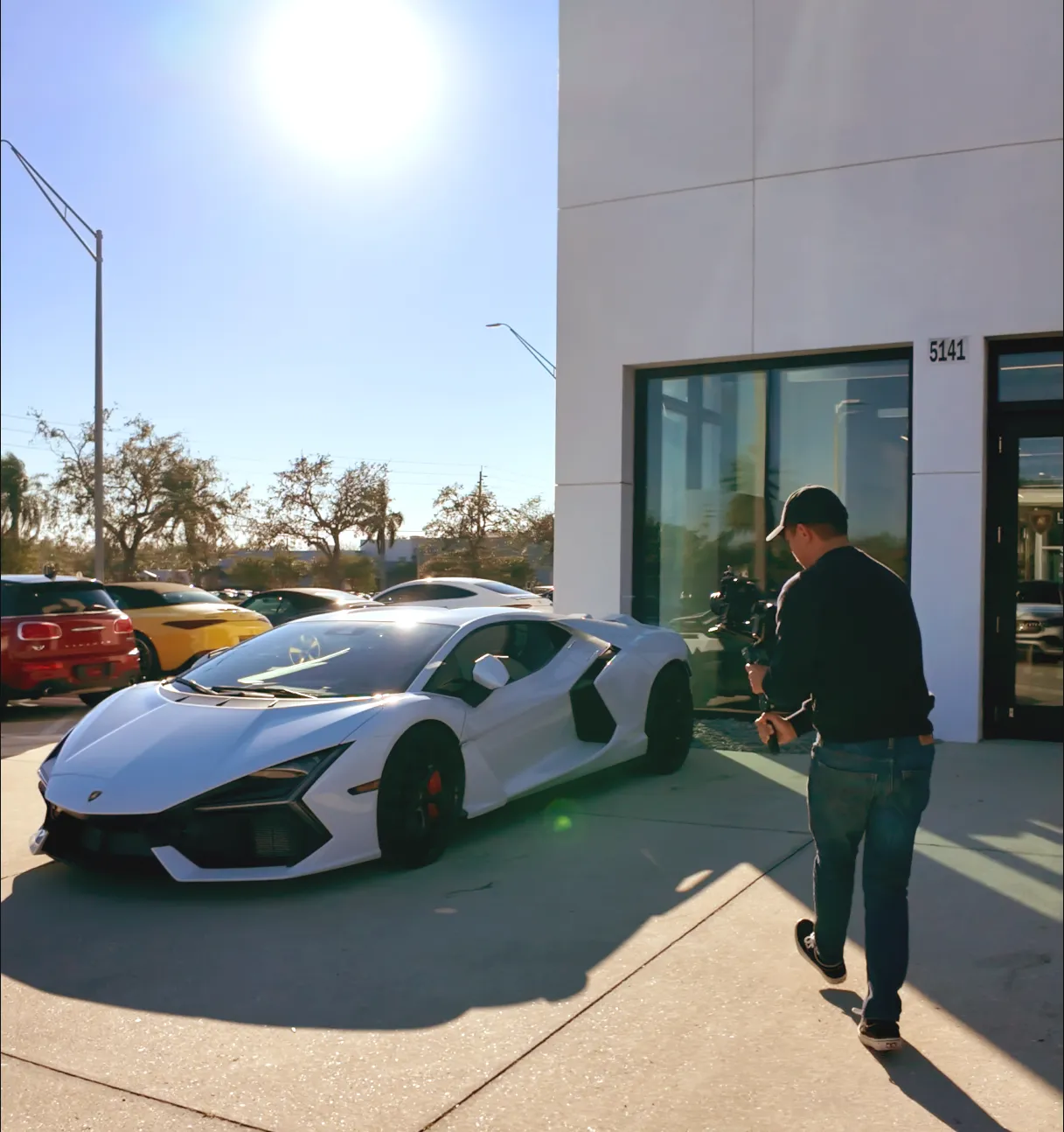 A FRGMENT operator filming a supercar on location